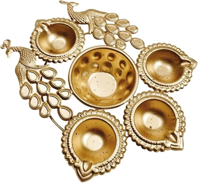 6 inch metal urli available in diya and peacock design