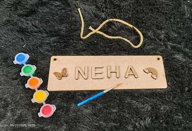 Diy name plate in wooden Best return gift option for kids Contains 1 wooden plank Alphabets as per name (upto 6) 2 charms as per girl or boy 1 thread Colors and brush If characters exceed 6 then 5 rs each alphabet