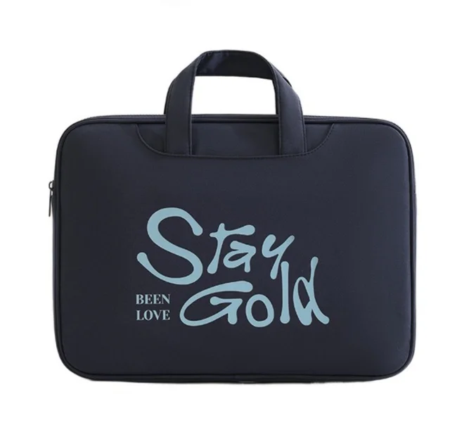 laptop bag with "Stay Gold" 