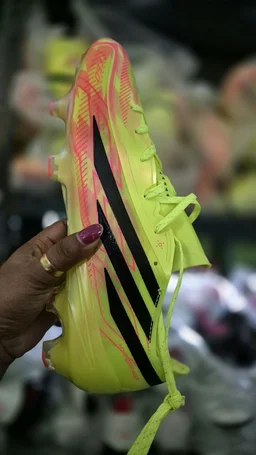 F50 Hyperfast EVO football/soccer With Less cleat. Solar Yellow, Core Black, and Solar Turbo Pink boot. - UK 6