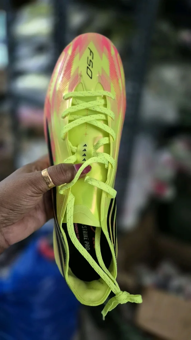 F50 Hyperfast EVO football/soccer With Less cleat. Solar Yellow, Core Black, and Solar Turbo Pink boot. - UK 7.5