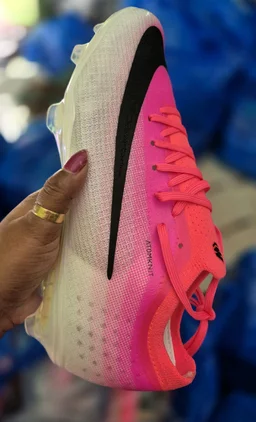 Mercurial Vapor 17 Elite FG.Bright pink/hot pink with a black Swoosh logo. - UK 10