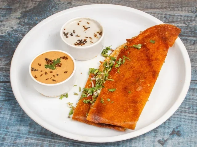 Sonar Tori Restaurant Schezwan Masala Dosa
