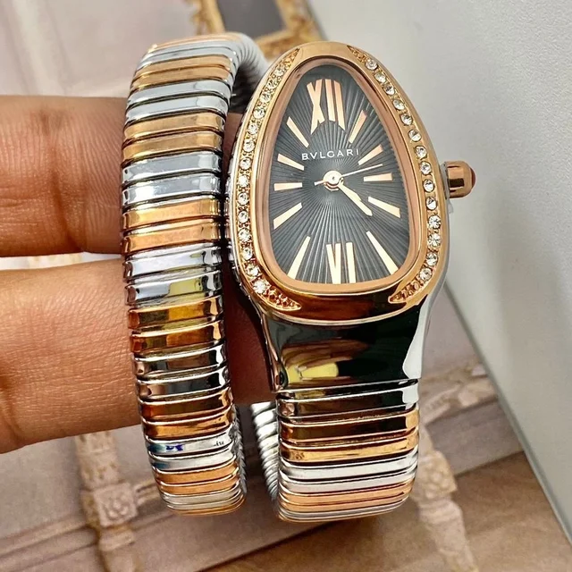 Bvalgarie Silver And Gold Snake Dial,power Full Japaneese Machinery And Stainless Steel - silver