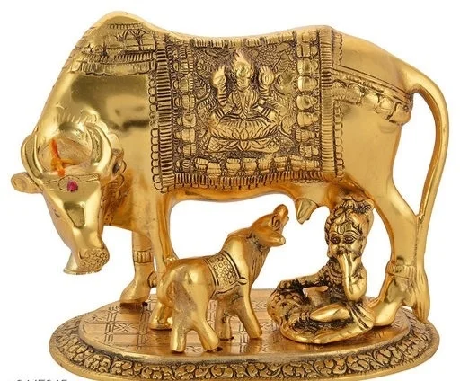 Silver plated kamdenu cow Statu Calf along with Balkrishana - Yellow Orange